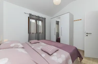 Krevet ili kreveti u jedinici u objektu Holiday Home Prapatna 17608