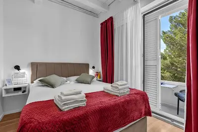 Krevet ili kreveti u jedinici u objektu Beachfront Deluxe B&B