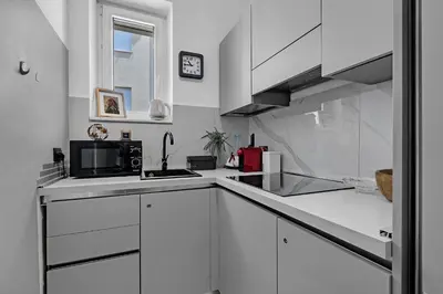Kuhinja ili čajna kuhinja u objektu Beachfront Deluxe B&B