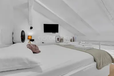 Krevet ili kreveti u jedinici u objektu Beachfront Deluxe B&B