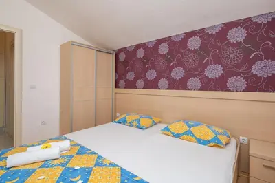 Krevet ili kreveti u jedinici u objektu Apartmani Kaštelančić