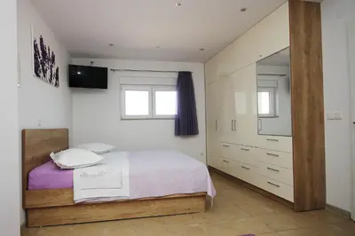Krevet ili kreveti u jedinici u objektu Apartmani Dalmacija