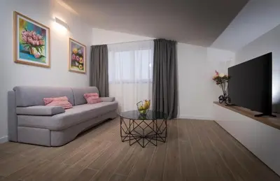 TV i/ili zabavni centar u objektu Villa J&J Apartments Residence with Swimming pool