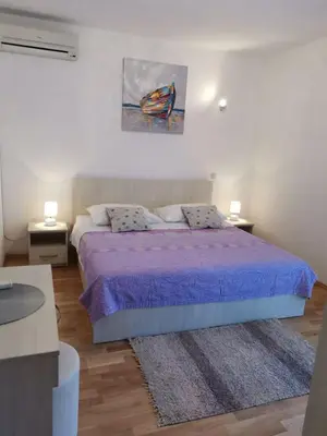 Krevet ili kreveti u jedinici u objektu Apartments Nikola Stipišić