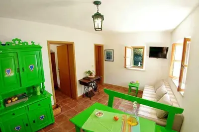 TV i/ili zabavni centar u objektu Charming House Selca + BBQ