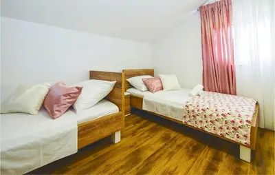 Krevet ili kreveti u jedinici u objektu Awesome Home In Sutivan
