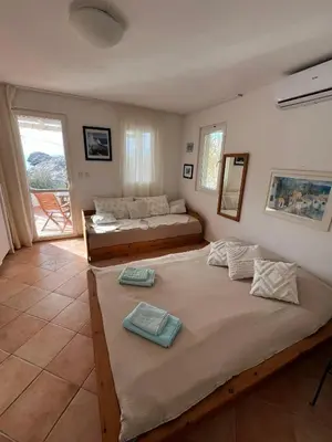 Krevet ili kreveti u jedinici u objektu Casa-Poseidon