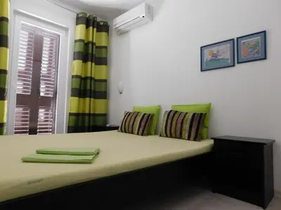 Krevet ili kreveti u jedinici u objektu Villa Renata - Apartment Zeleni