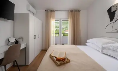 Krevet ili kreveti u jedinici u objektu VILLA ROKO with 4 bedrooms, 32sqm heated pool