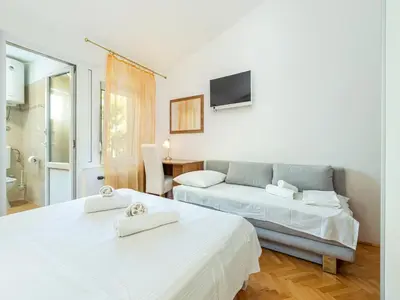 Krevet ili kreveti u jedinici u objektu Rosemary Apartments
