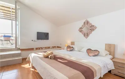 Krevet ili kreveti u jedinici u objektu Awesome Home In Makarska