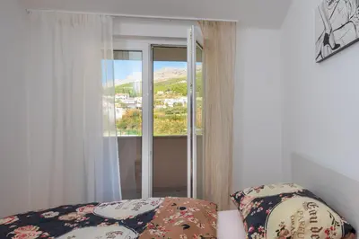 Krevet ili kreveti u jedinici u objektu Apartments Vuković
