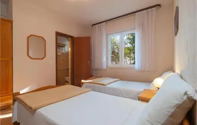 Krevet ili kreveti u jedinici u objektu Amazing Apartment In Splitska