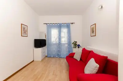 TV i/ili zabavni centar u objektu Apartments Jadro