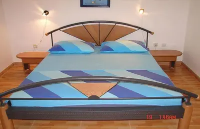 Krevet ili kreveti u jedinici u objektu Apartments Dijana
