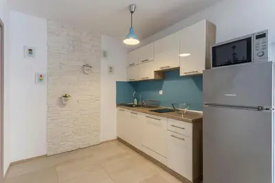 Kuhinja ili čajna kuhinja u objektu Apartments Fortica