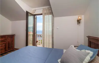 Krevet ili kreveti u jedinici u objektu Awesome Home In Postira With Wifi