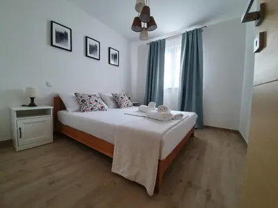 Krevet ili kreveti u jedinici u objektu L & L Apartmani