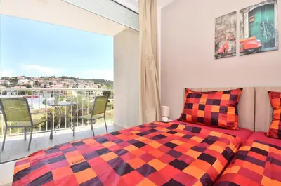 Krevet ili kreveti u jedinici u objektu Bretia Apartments