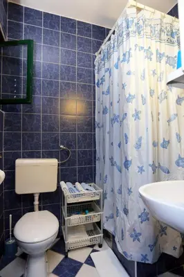 Kupaonica u objektu Apartments and rooms with parking space Makarska - 18028