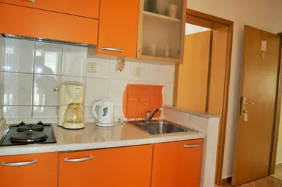 Kuhinja ili čajna kuhinja u objektu Apartments Sandy Beach