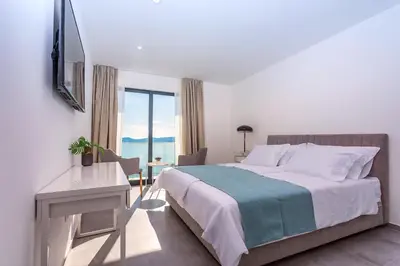 Krevet ili kreveti u jedinici u objektu Villa Perla Blu with 4 bedrooms, heated pool, jacuzzi, 50m from beach