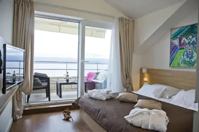 Krevet ili kreveti u jedinici u objektu Villa Dalmatina - Adults Only Apart-Hotel