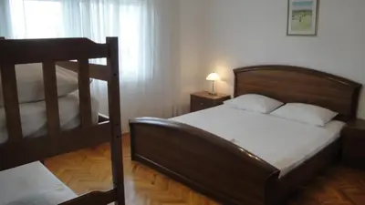 Krevet ili kreveti u jedinici u objektu Apartments and rooms by the sea Duce - Omis - 18155