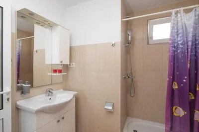 Kupaonica u objektu Beach Apartments 
