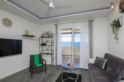 TV i/ili zabavni centar u objektu Seaside Deluxe