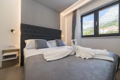 Krevet ili kreveti u jedinici u objektu Delux Apartments Sunset Beach