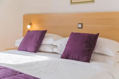 Krevet ili kreveti u jedinici u objektu Villa Dubrovnik