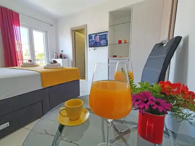TV i/ili zabavni centar u objektu Holiday Home Gordana