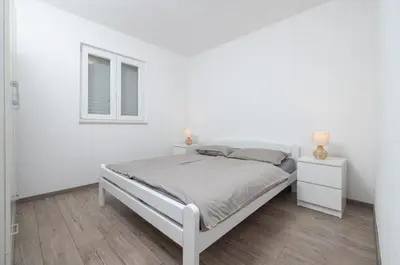 Krevet ili kreveti u jedinici u objektu Nane Garden house with heated pool