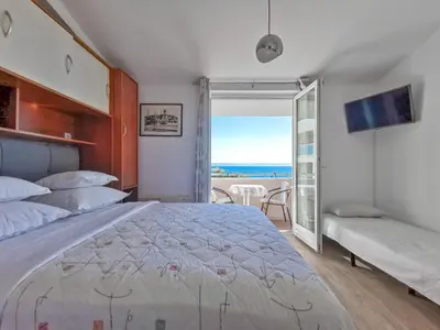 Krevet ili kreveti u jedinici u objektu Apartments Vukadin