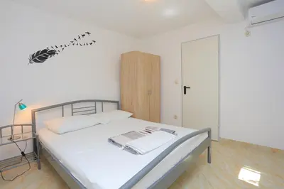Krevet ili kreveti u jedinici u objektu Apartments by the sea Duce, Omis - 18302