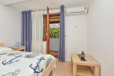 Krevet ili kreveti u jedinici u objektu House Santro