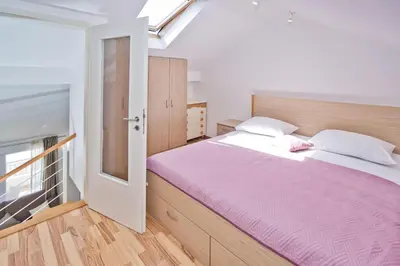 Krevet ili kreveti u jedinici u objektu Relaxing holiday sunset apartment