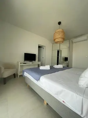 Krevet ili kreveti u jedinici u objektu Exclusive 2 Bedroom Seafront Suite with jacuzzi