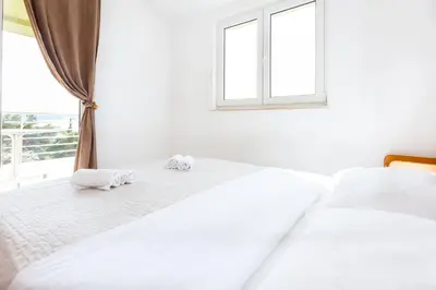 Krevet ili kreveti u jedinici u objektu AGA beach suites