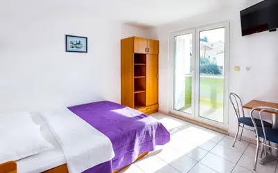 Krevet ili kreveti u jedinici u objektu AGA beach suites