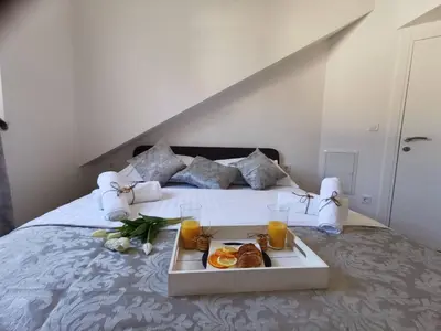 Krevet ili kreveti u jedinici u objektu Olmissum rooftop sea view