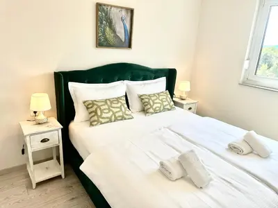 Krevet ili kreveti u jedinici u objektu Fiori Boutique Apartment