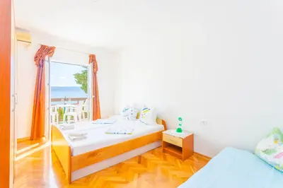 Krevet ili kreveti u jedinici u objektu APARTMANI GRBAVAC