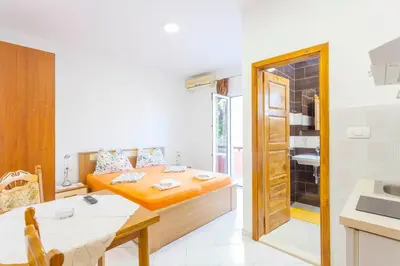 Krevet ili kreveti u jedinici u objektu APARTMANI GRBAVAC