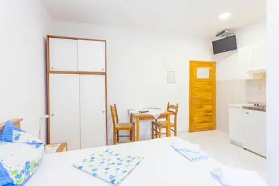 Krevet ili kreveti u jedinici u objektu APARTMANI GRBAVAC