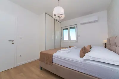 Krevet ili kreveti u jedinici u objektu Apartman Sunset
