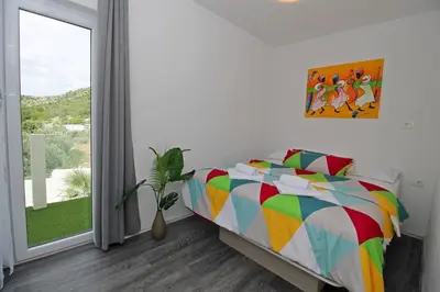 Krevet ili kreveti u jedinici u objektu Villa Caribic with 72sqm private pool, whirlpool, sauna, outdoor lounge area