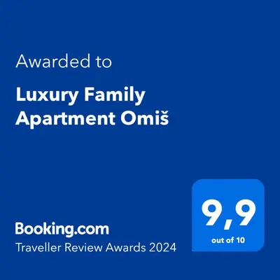 Certifikat, nagrada, logo ili neki drugi dokument izložen u objektu Luxury Family Apartment Omiš