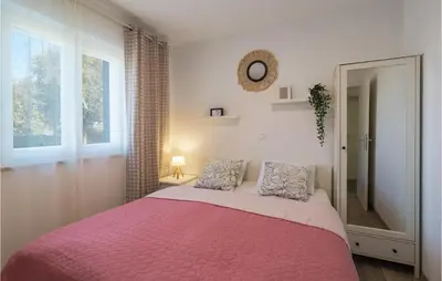 Krevet ili kreveti u jedinici u objektu Beach Front Home In Postira